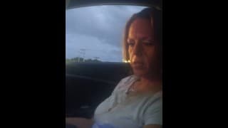 Milf smoking cigarettes while in passenger seat in vehicle